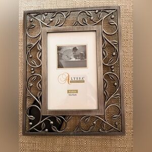 Vintage silver color frame.